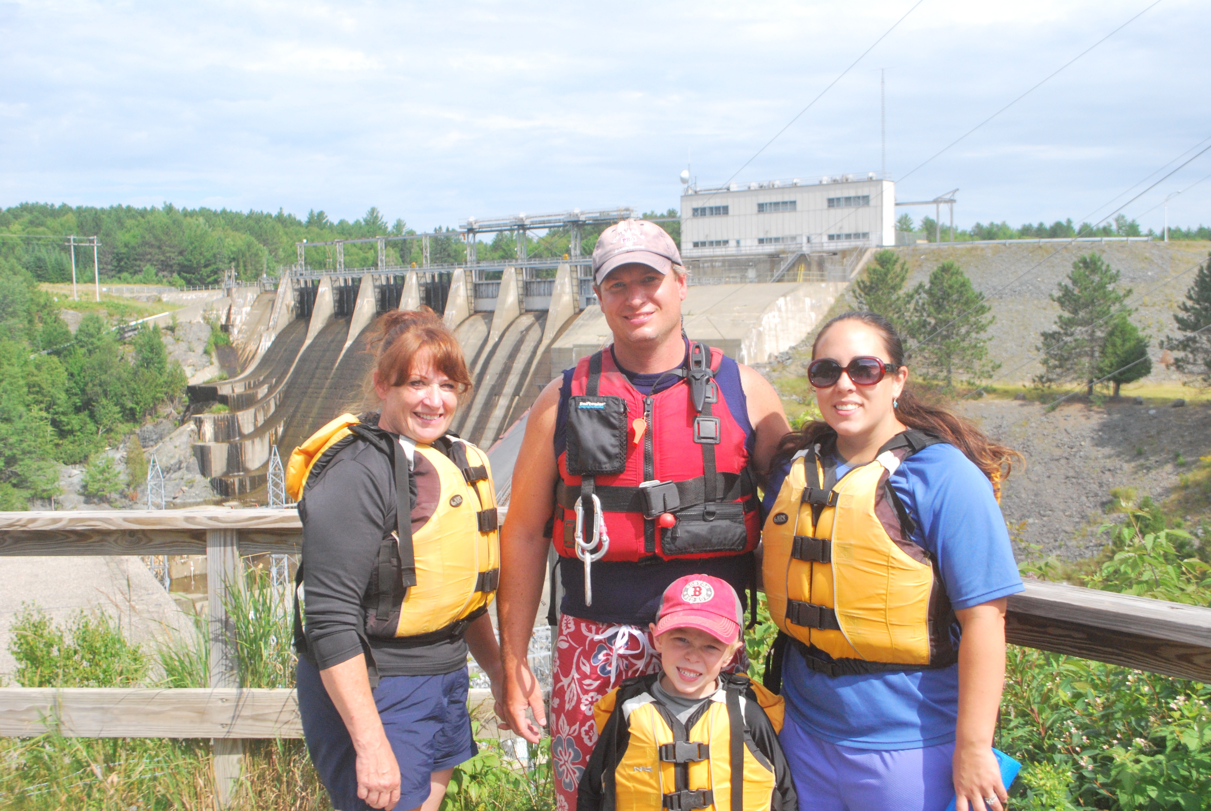 Group of rafters wearing sunscreen and ready to get on the river.